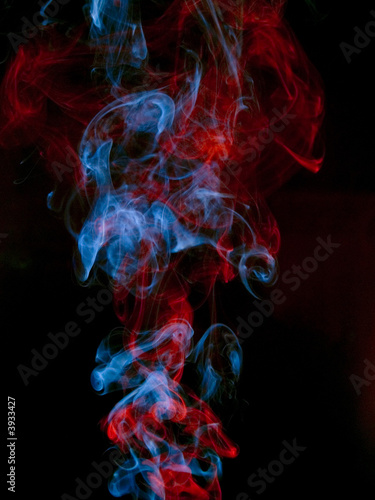 Red and blue smoke © IgorPetrovic