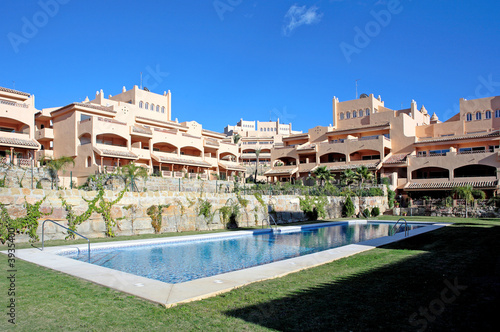 Sunny apartment block on Spanish urbanisation 