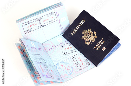 US passports with stamps for London, Rome, Frankfurt.