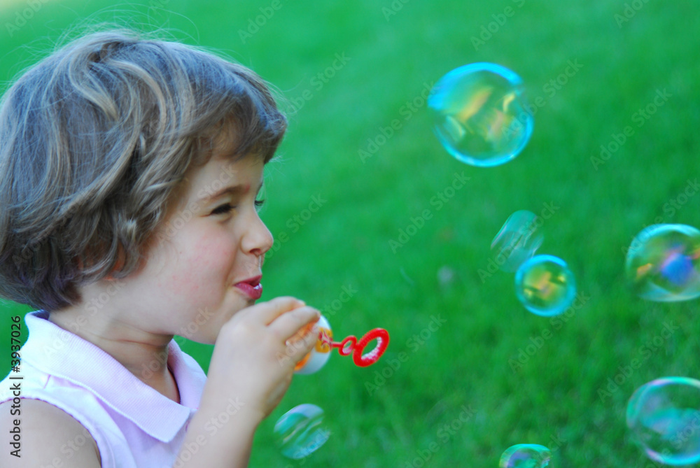 beautiful four years old playing with bubbles beautiful four years old playing with bubbles