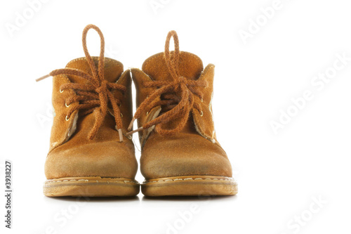 Child shoes from the front isolated over a white background