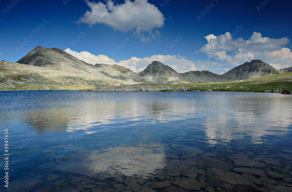 Glacial lake and mountain peak Kamenica at NP Pirin, Bulgaria Glacial lake and mountain peak Kamenica at NP Pirin, Bulgaria
