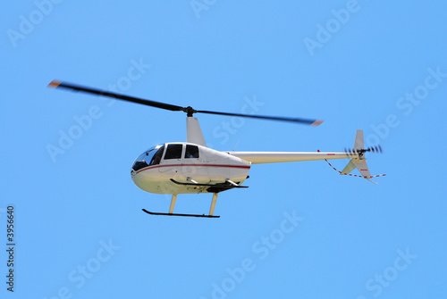Light sightseeing helicopter in flight