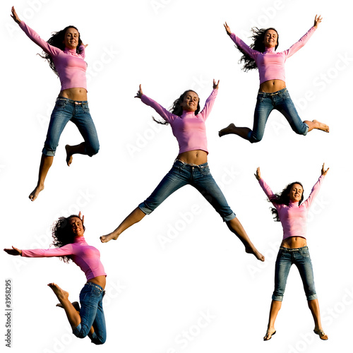 Wallpaper Mural Happy young beautiful girl jumping. Isolated on white background Torontodigital.ca