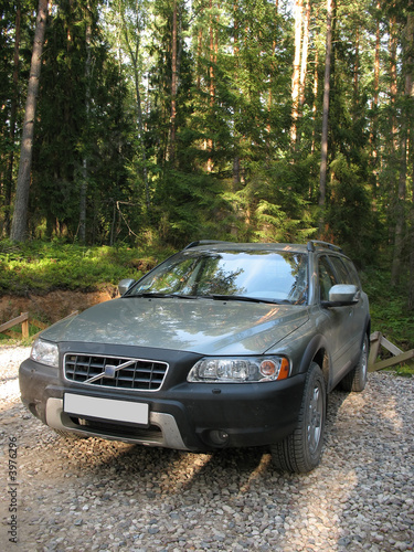 4x4 European wagon parked on a forest.