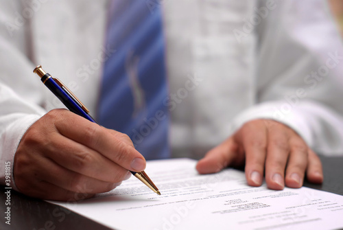 Business man signing contract