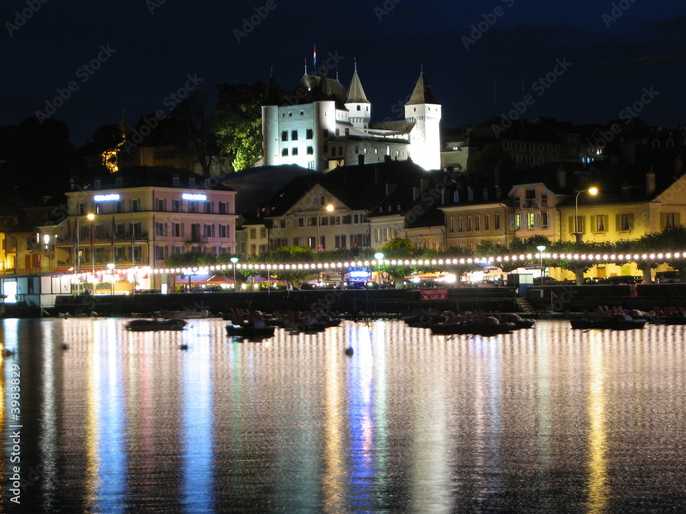 Nyon (Swiss) castle view from lake side at night time