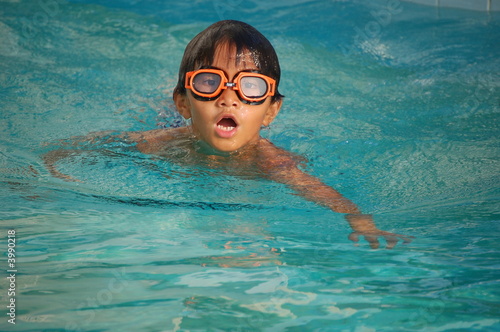 Asian Boy With Orange Swim Goggles