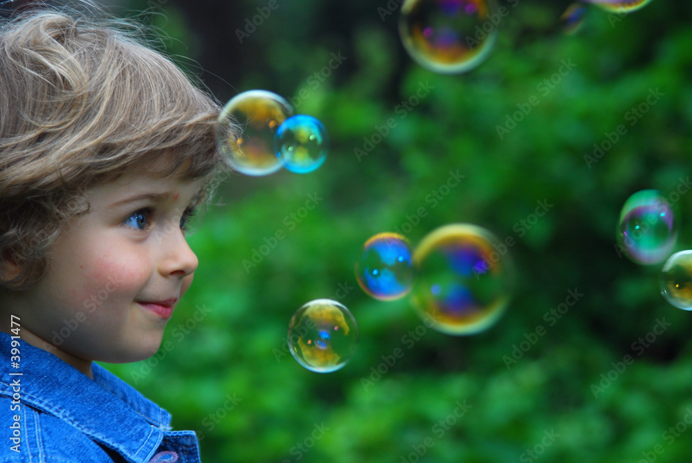 beautiful four years old playing with bubbles beautiful four years old playing with bubbles