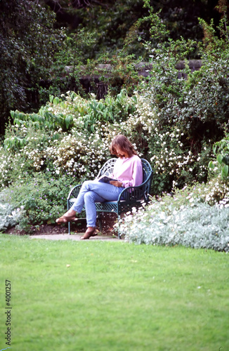 Woman reading in a park.