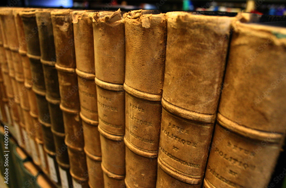 Close-up of Shelf of Leather Bound Books Close-up of Shelf of Leather Bound Books