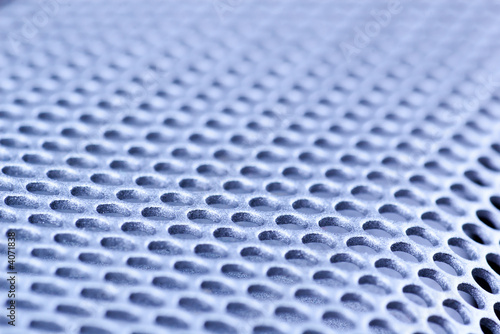blue toned perforated metal background