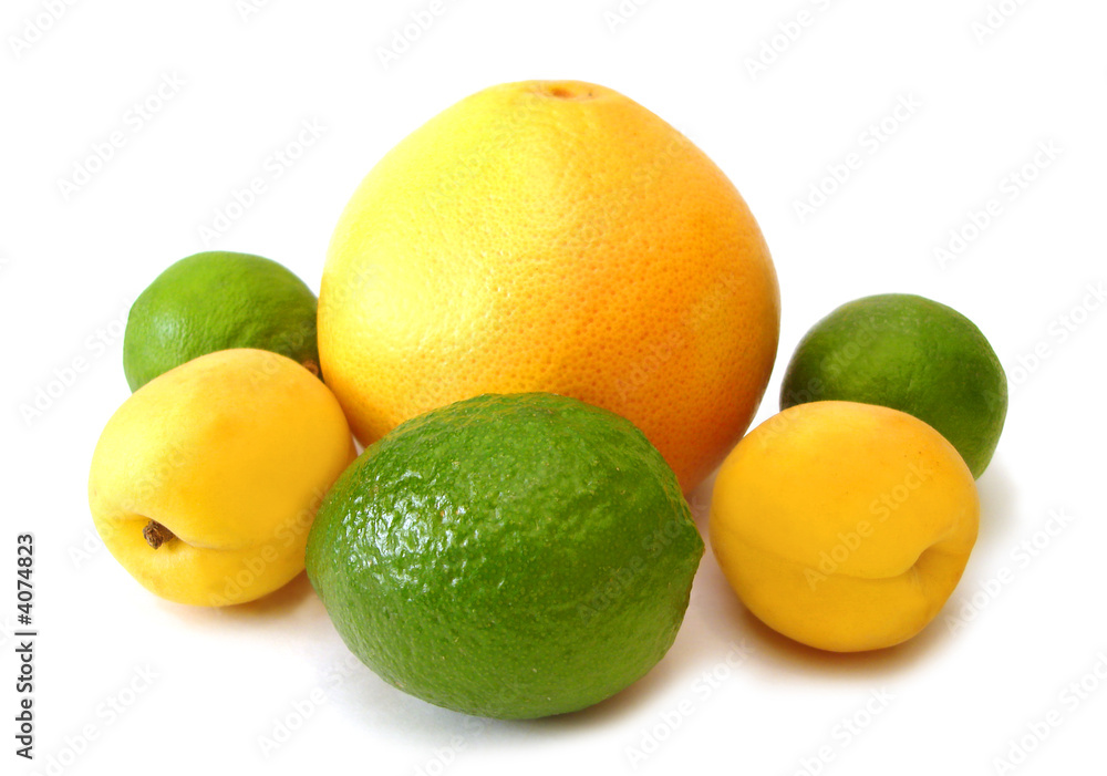 yellow lemons and green limes on white background yellow lemons and green limes on white background