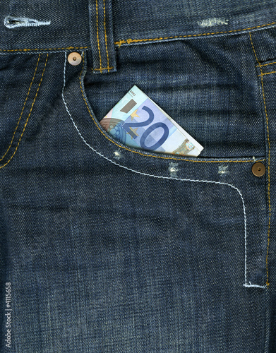 Money in pocket, blue jeans photo