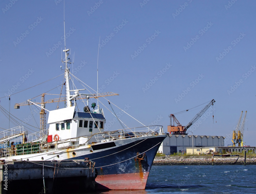 Fishing boat on dock Fishing boat on dock