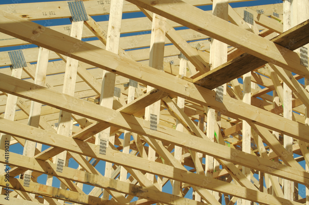 New residential construction home framing. New residential construction home framing.