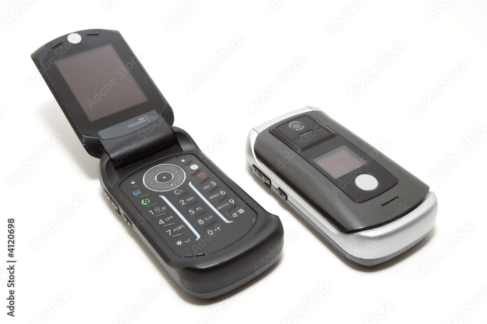 pair of hi-tech clamshell mobile phones pair of hi-tech clamshell mobile phones