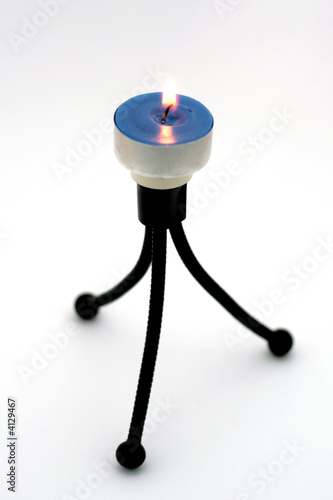 candle on a tripod