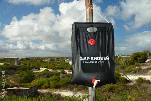 camp shower with view to bush and sky