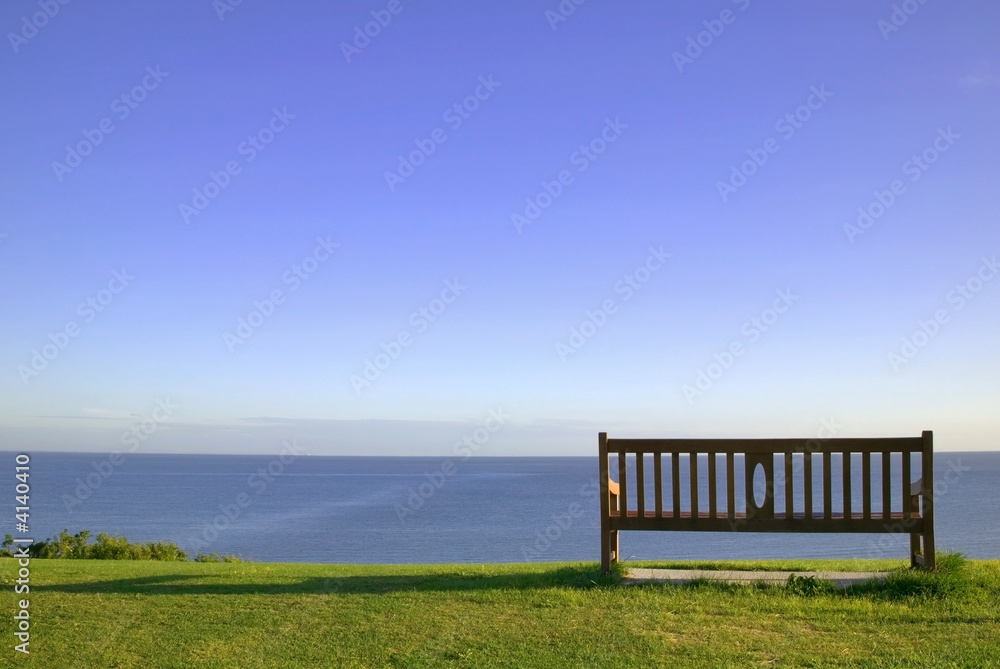Empty bench looking out to sea.