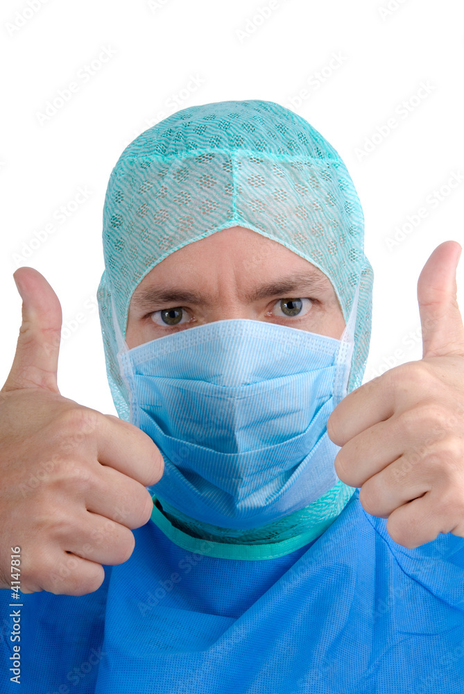 Thumbs up. Young doctor. Studio picture Thumbs up. Young doctor. Studio picture