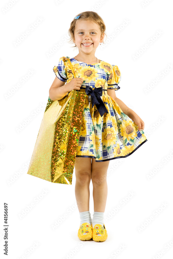 Little smiling girl with shopping bag. Little smiling girl with shopping bag.