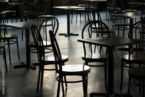 Tables and chairs in a cafeteria © Studio Light & Shade