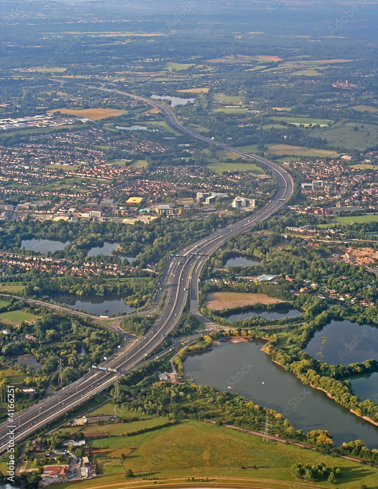 m25 motorway passing through countryside and towns