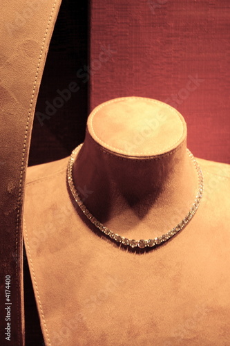 Diamond Necklace in Store Displayed on Suede Mannequin Bust