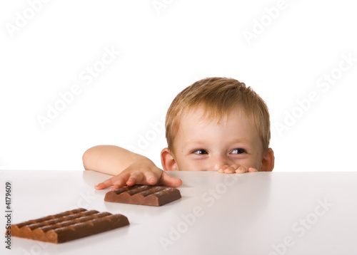 The child and a chocolate