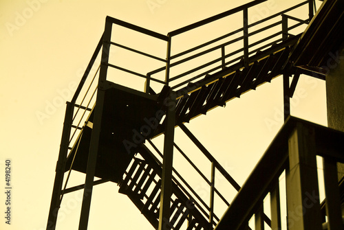 Obraz na plátně Antique Fire escape at Sunset