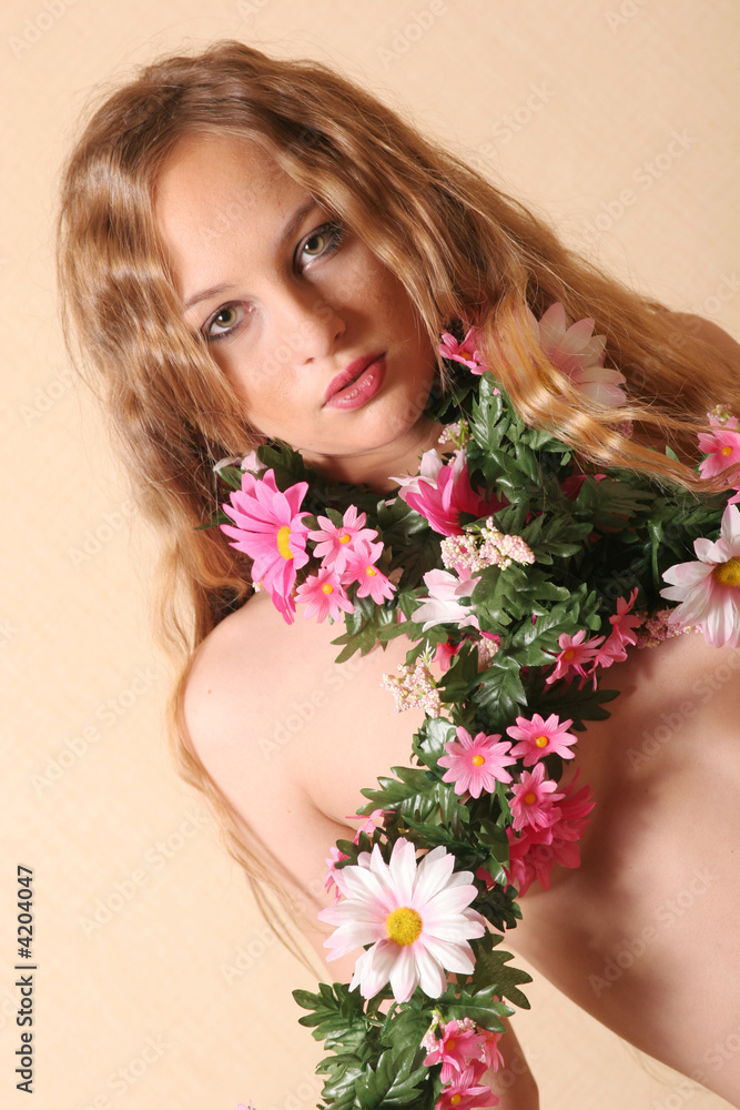 Beautiful woman in flowers
