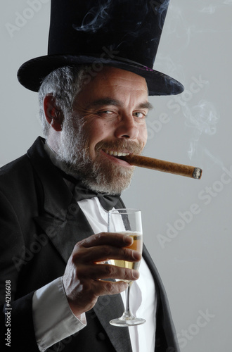 man with glass and cigar