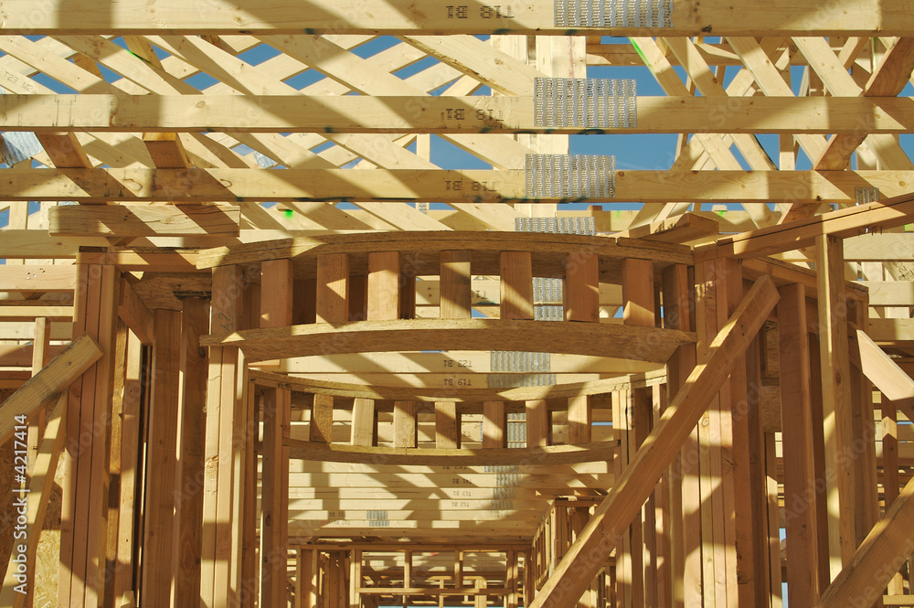 New residential construction home framing. New residential construction home framing.