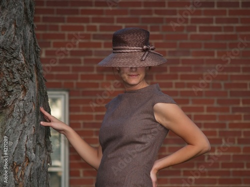 Woman Posing by the Tree