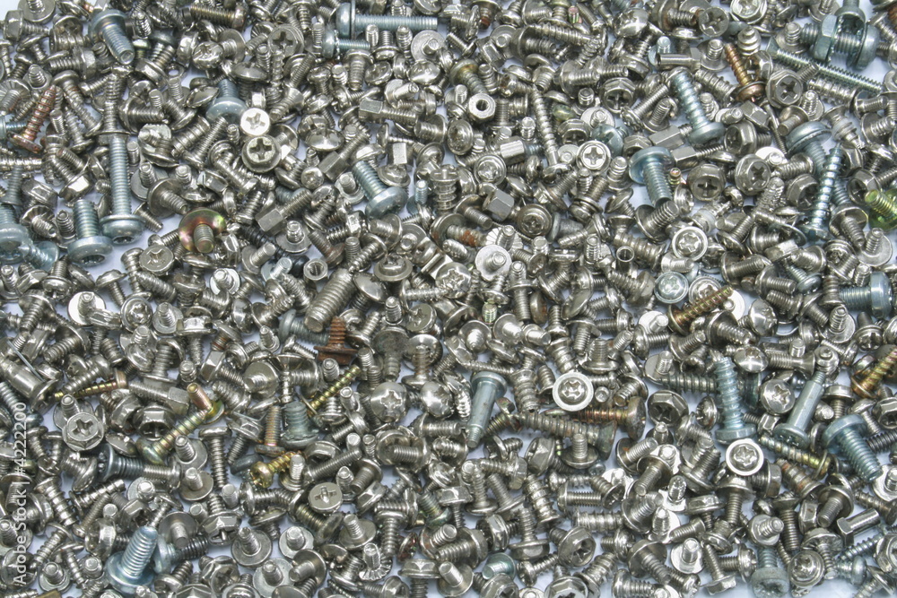 lots of assorted metal screws for background lots of assorted metal screws for background