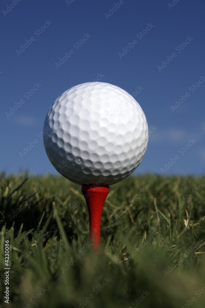 Golf Ball & Red Tee Golf Ball & Red Tee