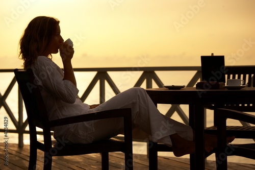 drinking tea at sunset photo