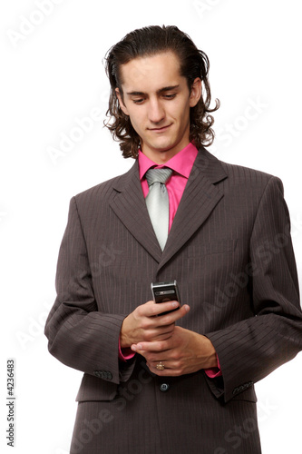 businessman with a mobile phone in hand. on white 