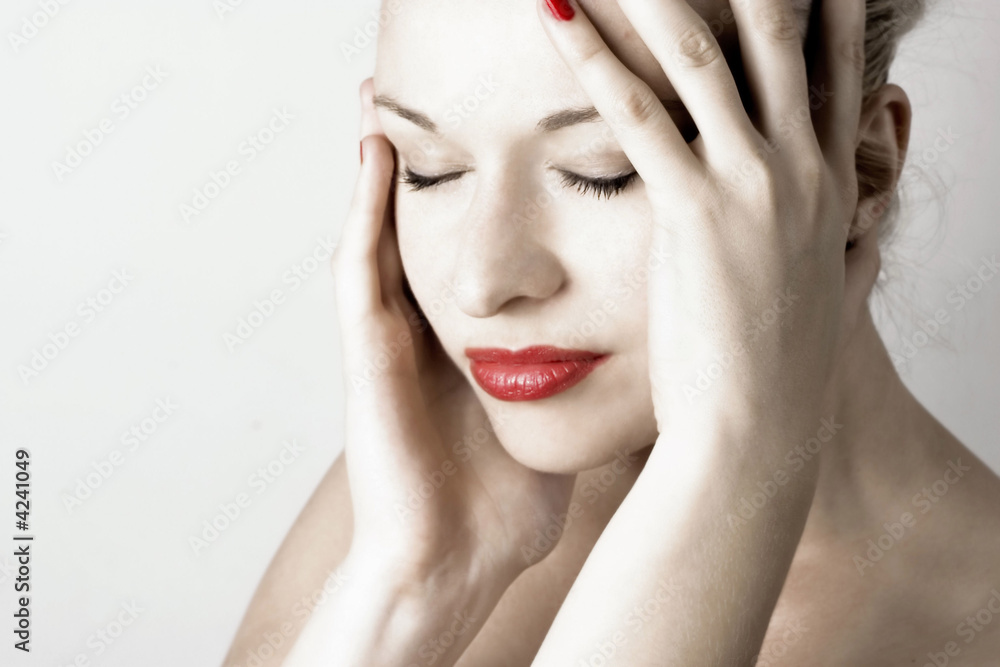 Fototapeta premium Beautiful lady holding head