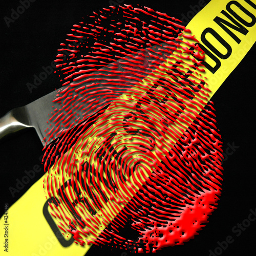 Crime scene tape and fingerprint