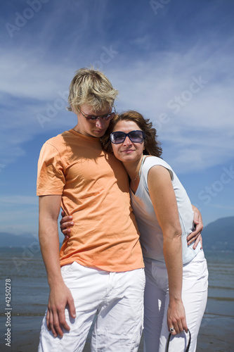 young couple posing on the beach in vancouver © fred goldstein