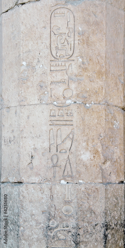 carved hieroglyph writing