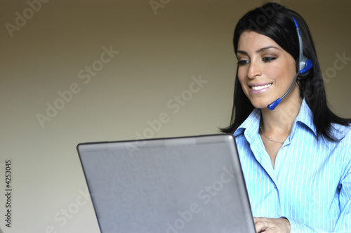 Secretaria no computador photo
