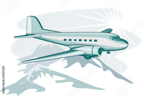 Airliner flying over mountains