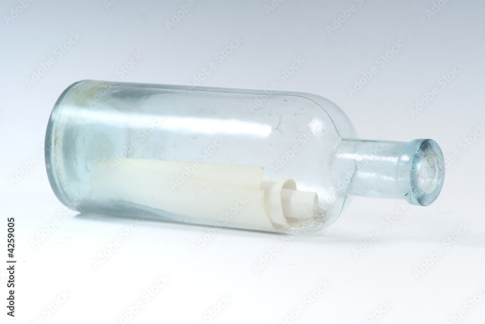 Paper scroll with message in the bottle Paper scroll with message in the bottle