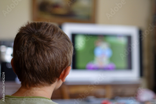 Canvas-taulu enfant qui regarde la télé