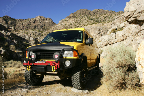 4x4 yellow van off road in Kings Canyon, Utah