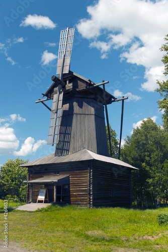 Wooden wind mill in old tradition