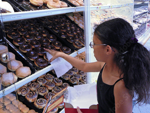 Girl Choosing Doughnuts